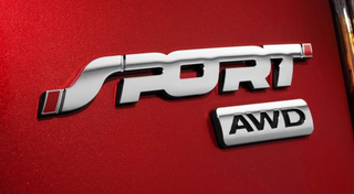 Illustration for article titled Why do we still have drivetrain badges?